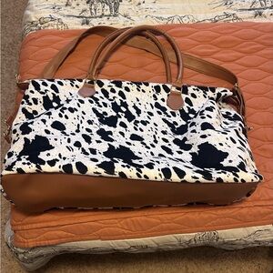 Faux cowhide weekend bag